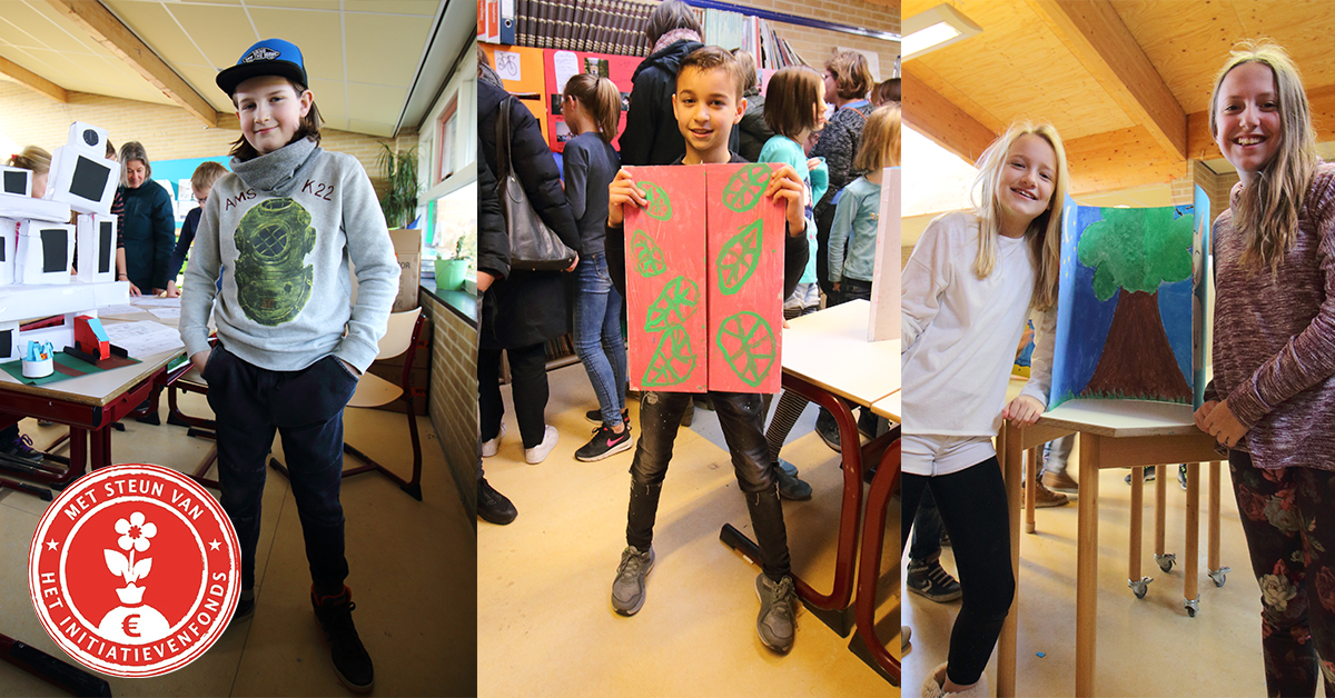 Kinderen die hebben deelgenomen aan Spoken Art Community tonen hun werk.